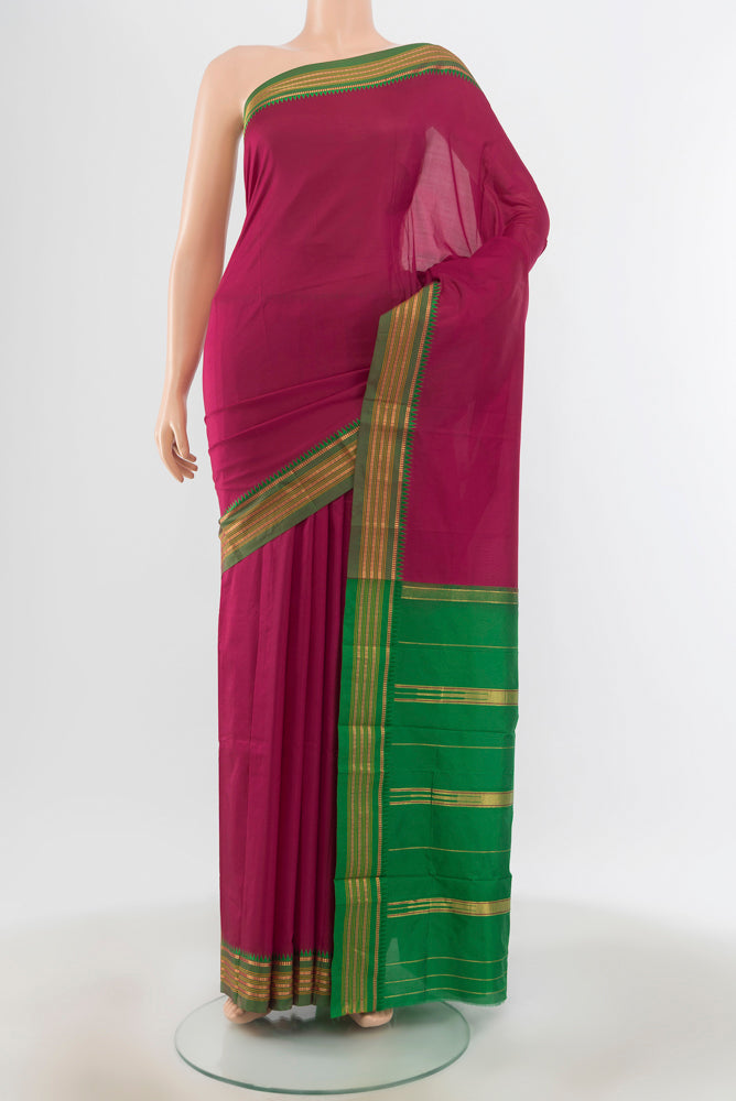 Dark Pink Narayanpet Silk Saree with Plain Body and Silk Border.  displayed on a mannequin