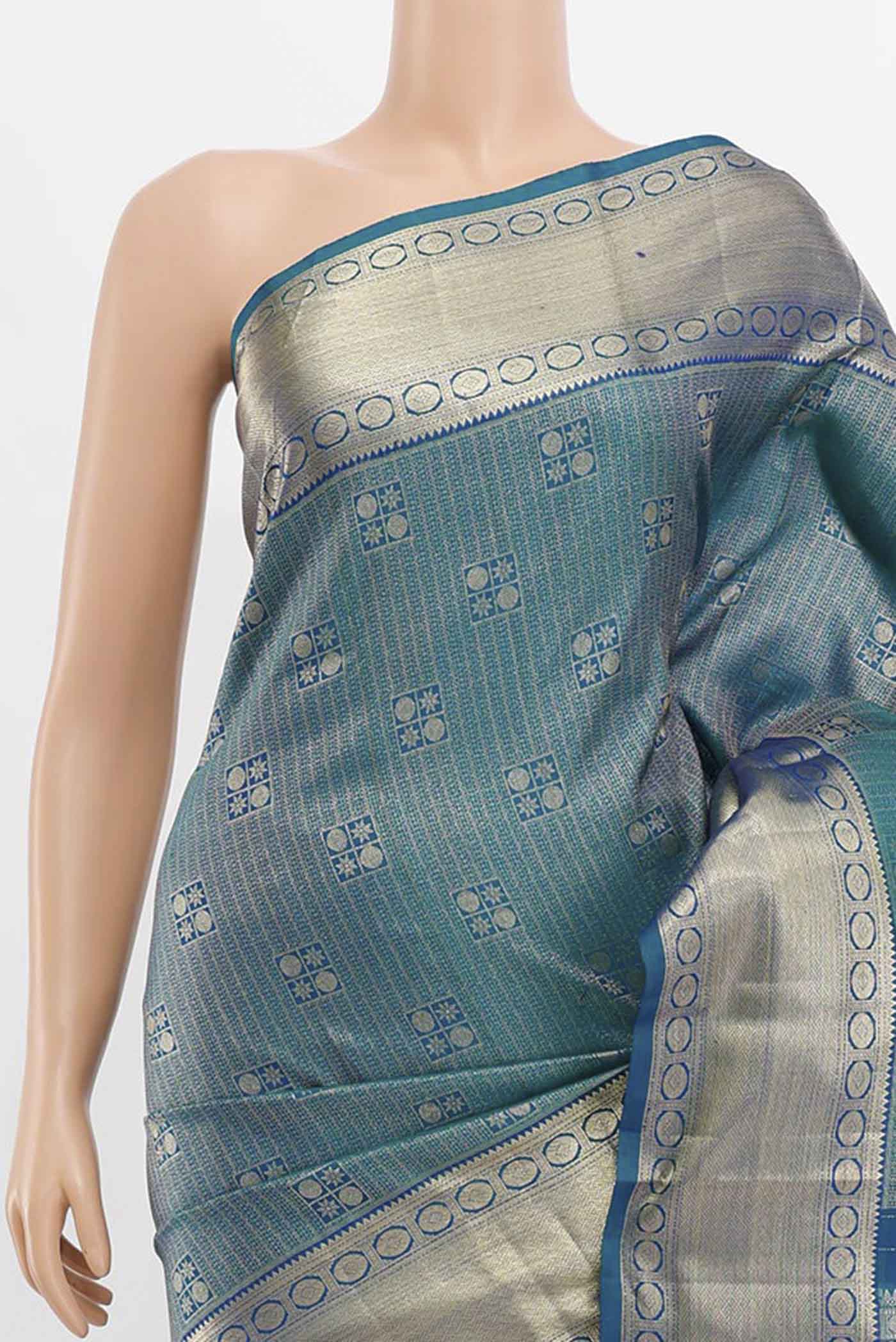 Border image of Peacock Blue Kanchipuram Silk Saree with Zari Butta on the body and Silk Border. 