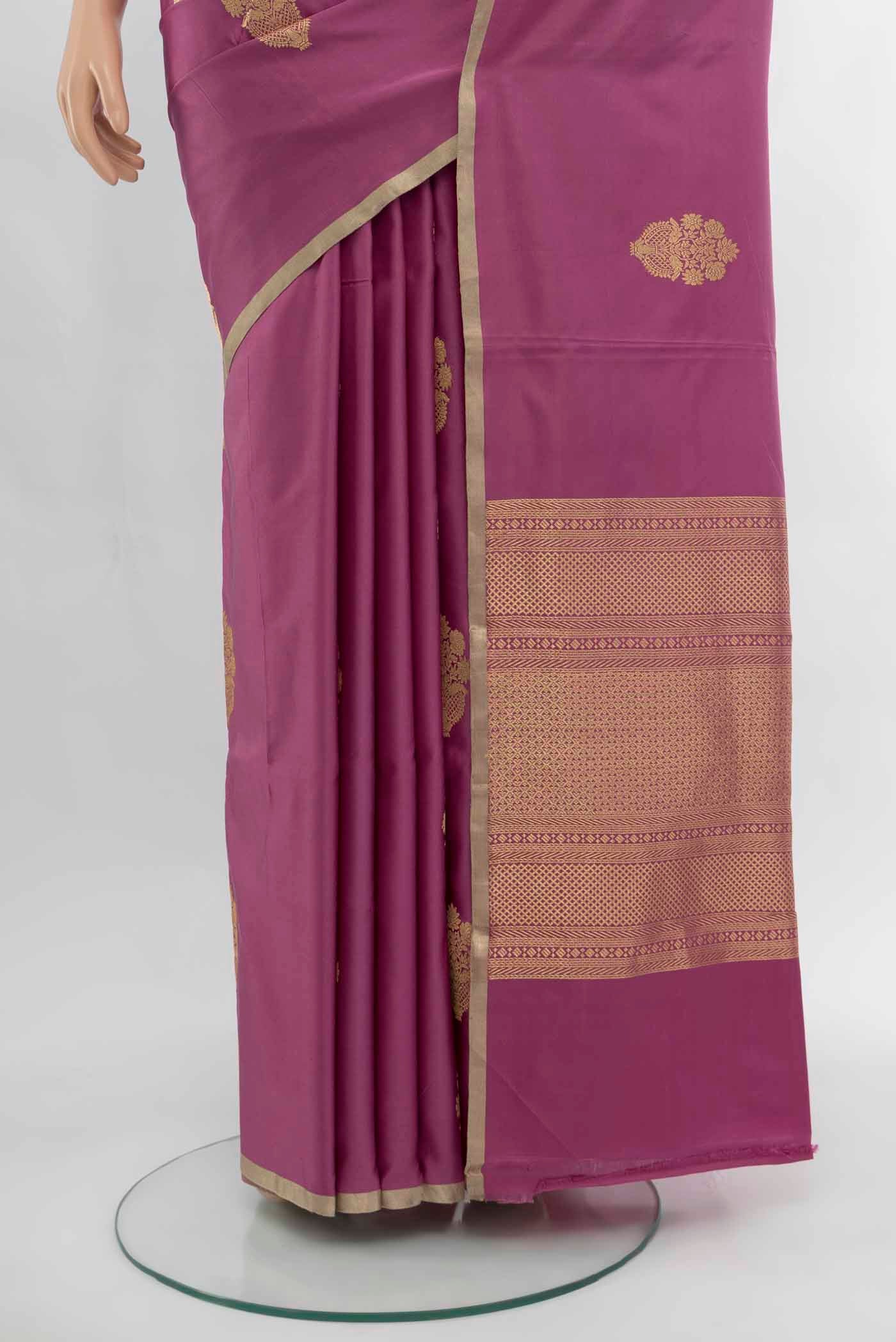 Pleats and pallu of Light Magenta Banarasi Katan Silk Saree with Zari Butta on the body and Silk Border. 