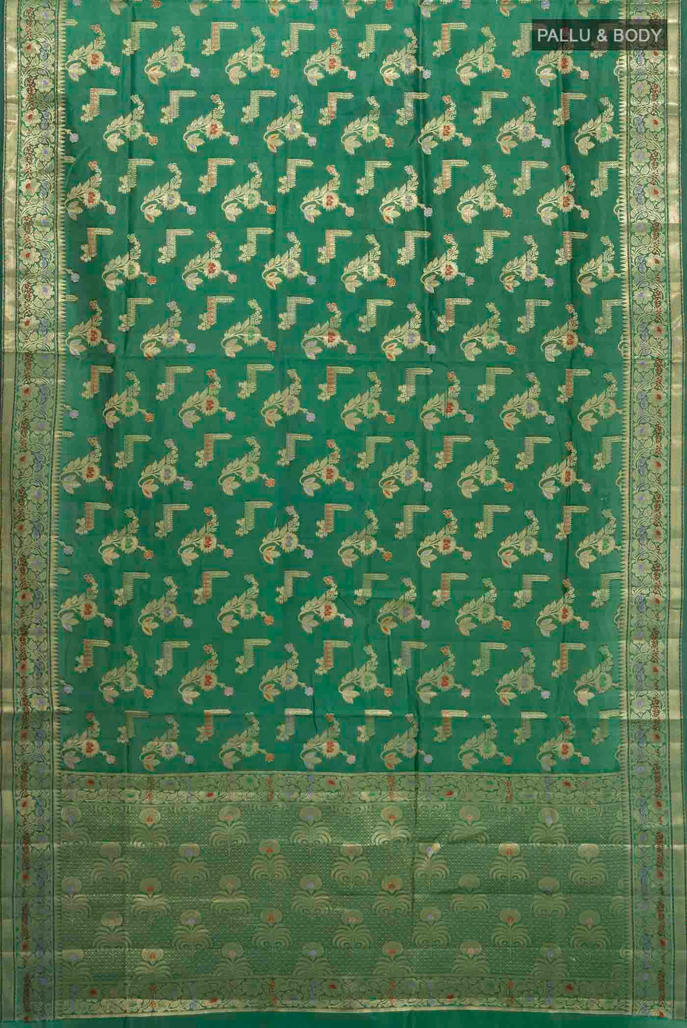 Flat view of Bottle Green Banarasi Raw Silk Saree with Zari Butta on the body and Silk Border