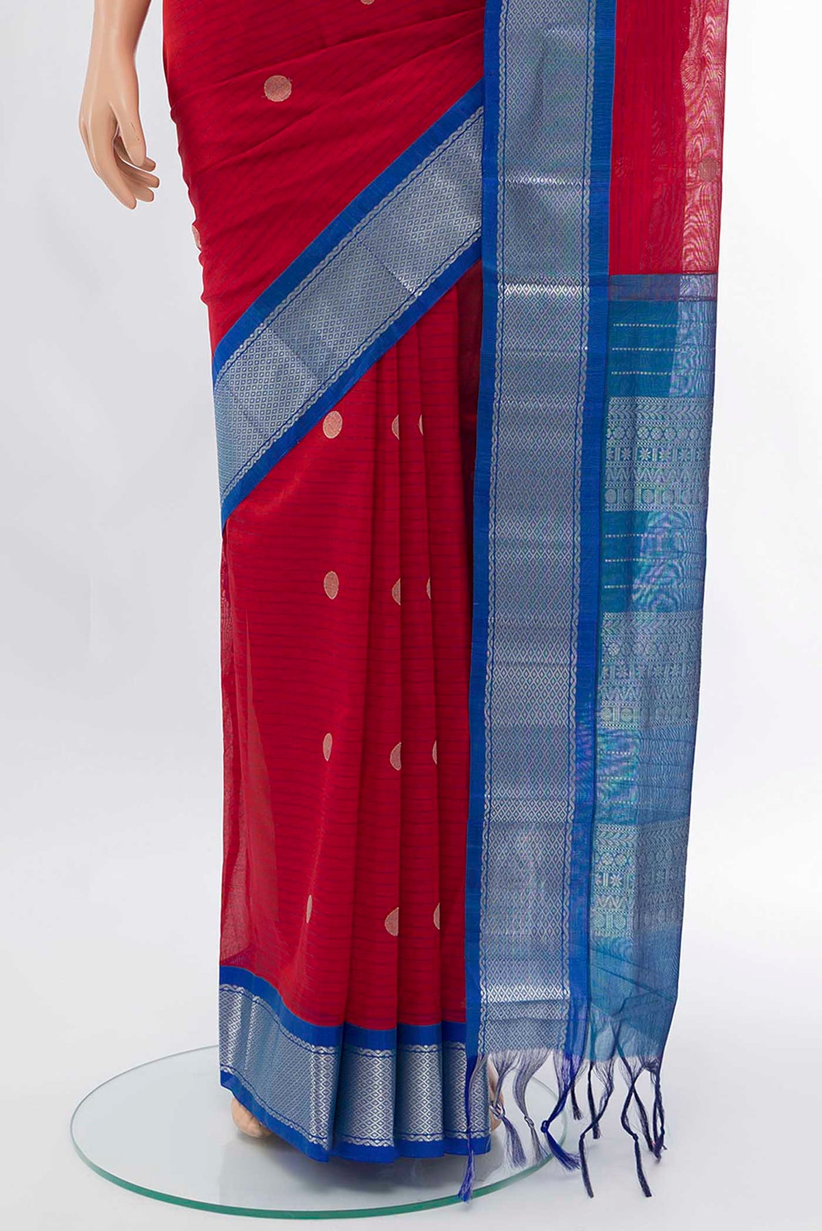 Pleats and pallu of Red Cotton Saree with Zari Brocade on the body and Silk Border