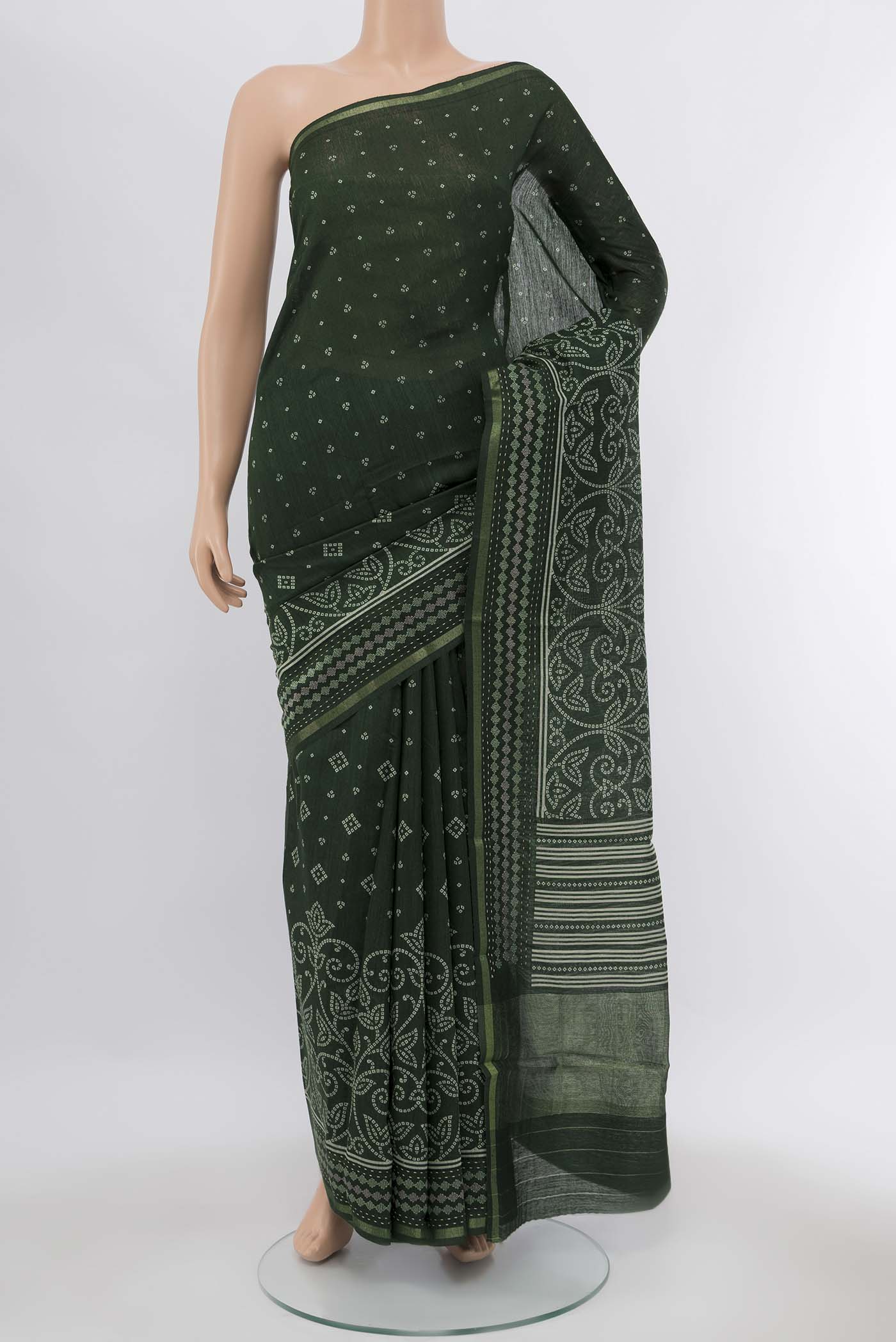 Green Printed Silk Saree with Floral Print on the body and Silk Border displayed on a mannequin