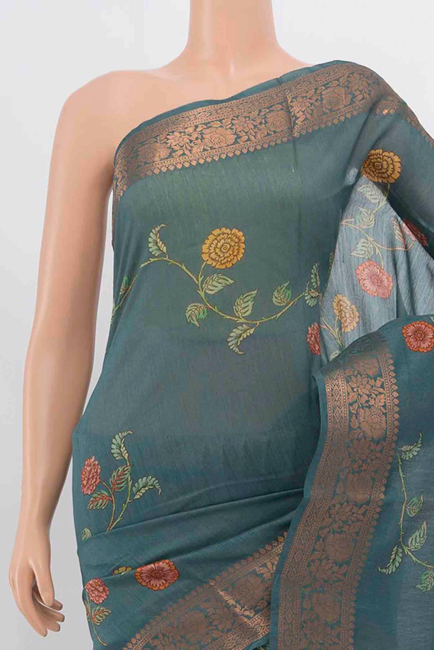 Border image of Grey Tussar Silk Saree with Zari Butta on the body and Silk Border. 