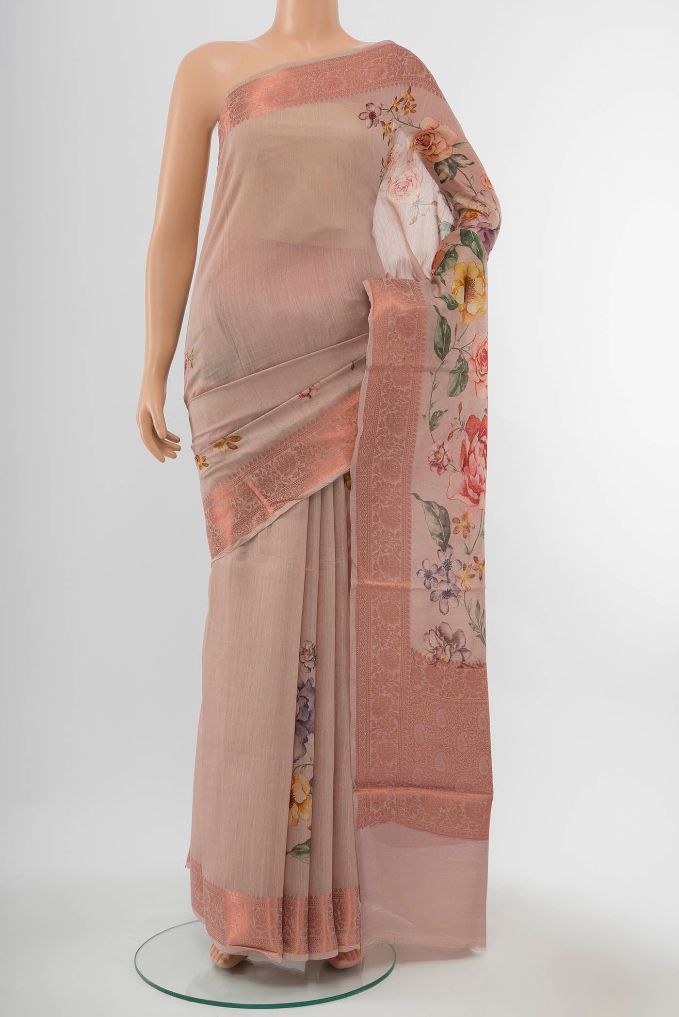 Beige Tussar Silk Saree with Zari Butta on the body and Silk Border displayed on a mannequin