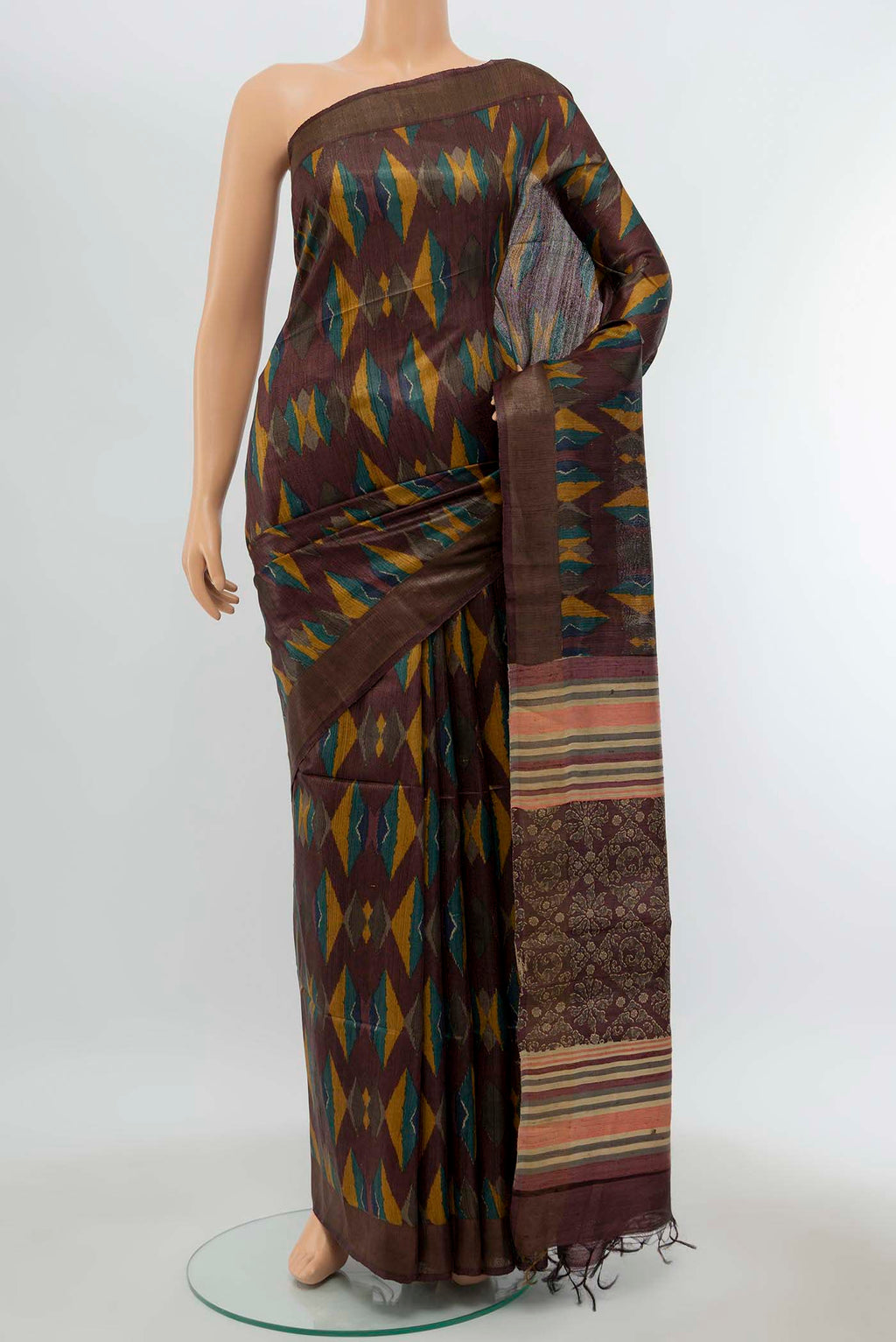 Brown Tussar Silk Saree with Zari Butta on the body and Silk Border displayed on a mannequin