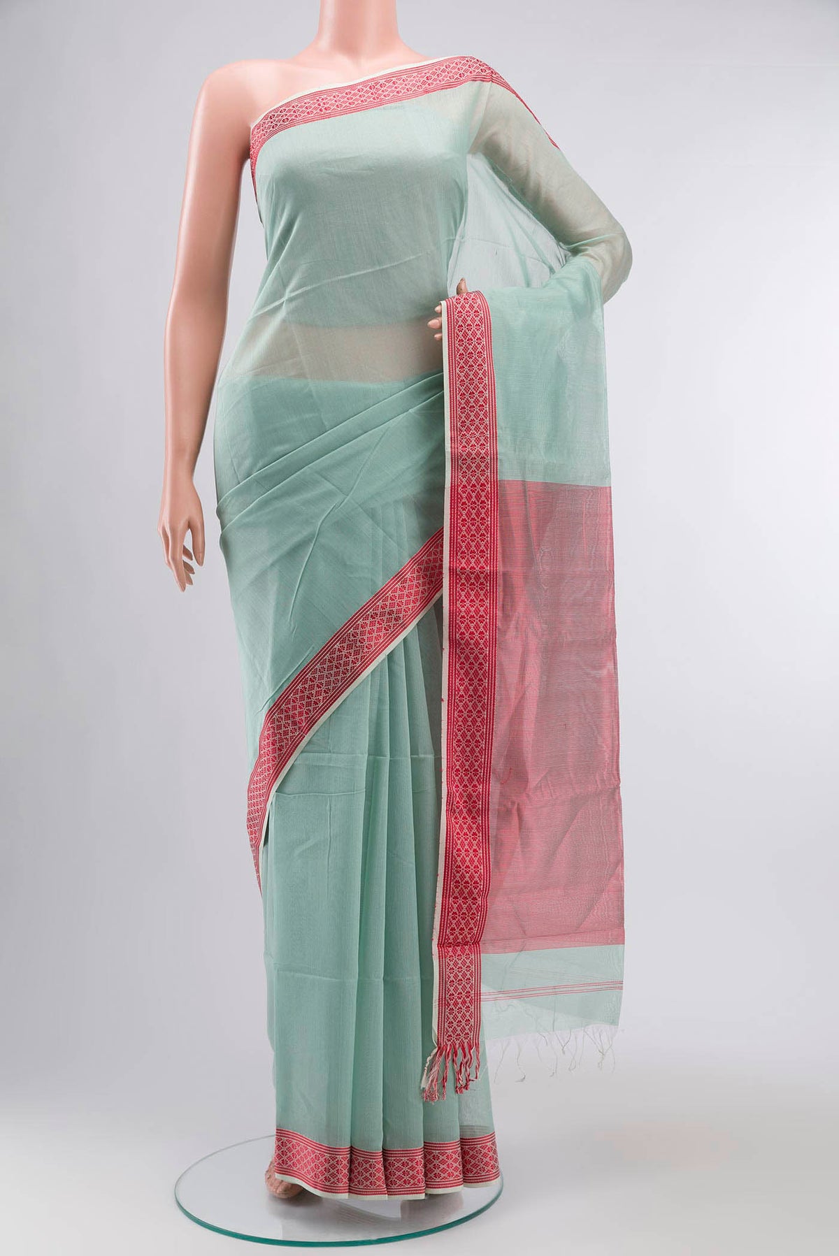 Light Blue Maheshwari Silk Cotton Saree with Plain Body and Thread Border displayed on a mannequin