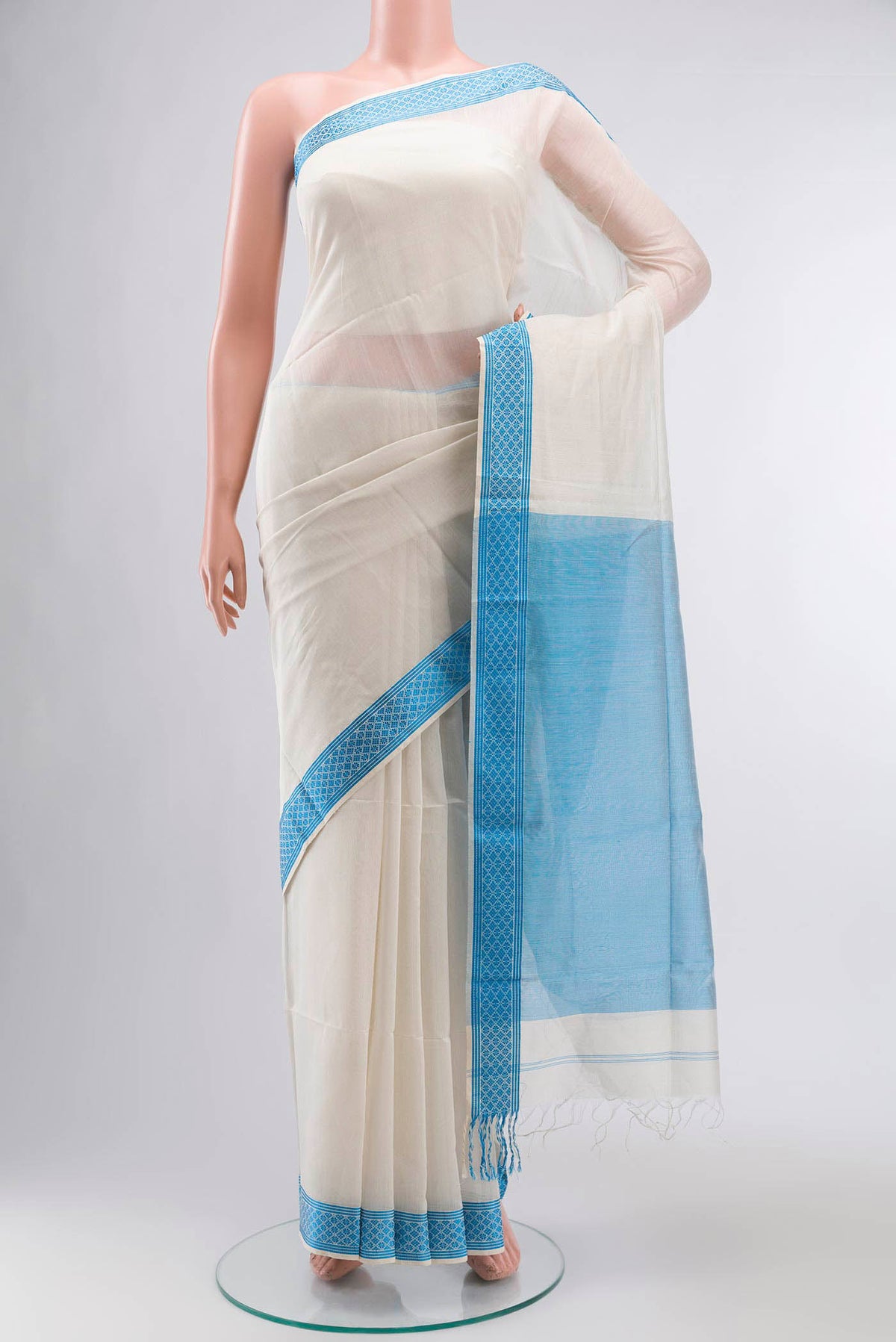 Off White Maheshwari Silk Cotton Saree with Plain Body and Thread Border displayed on a mannequin
