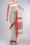 Cream Maheshwari Silk Cotton Saree with Zari And Thread Butta on the body and Thread Border displayed on a mannequin