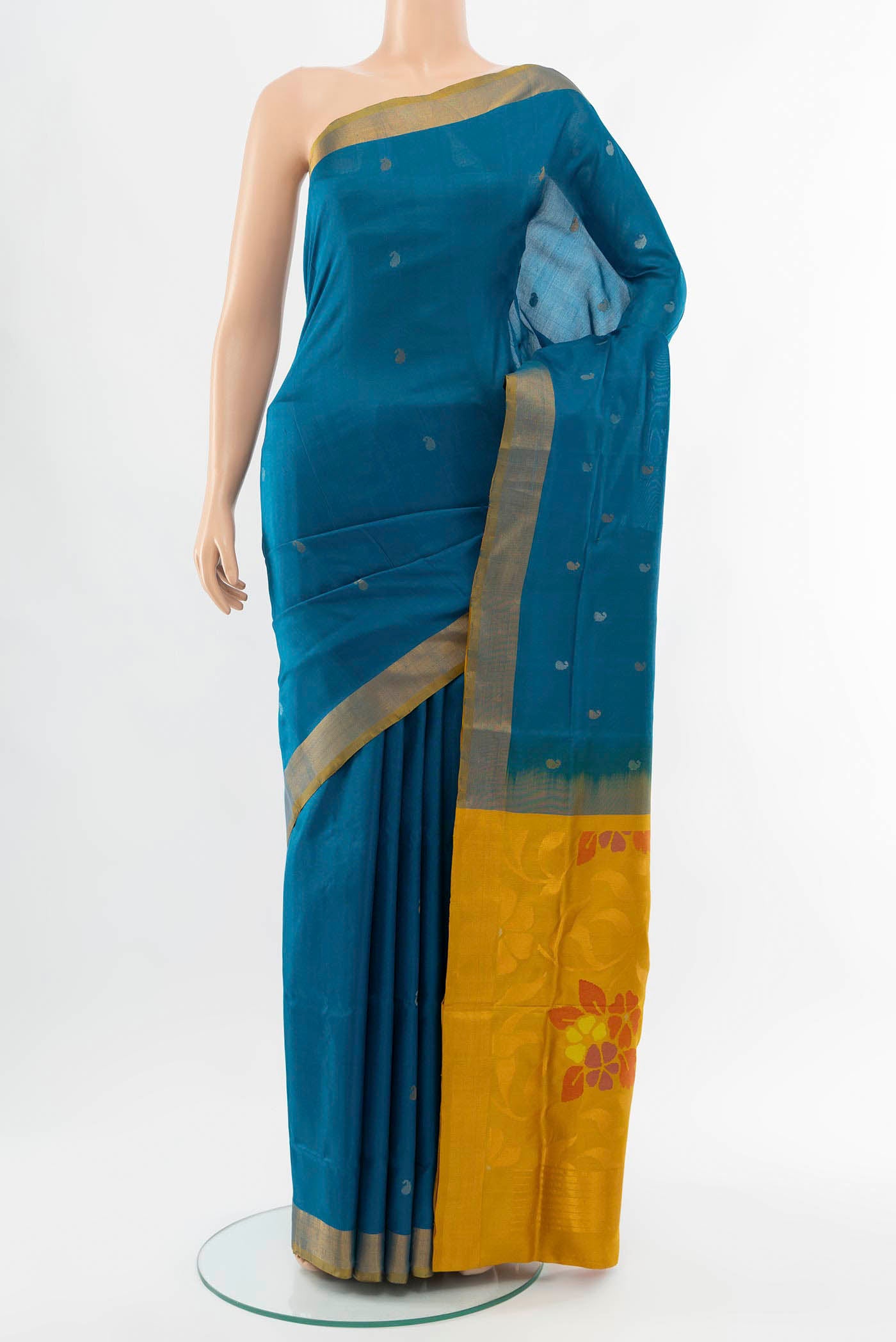 Light Blue Uppada Silk Saree with Zari Butta on the body and Silk Border displayed on a mannequin