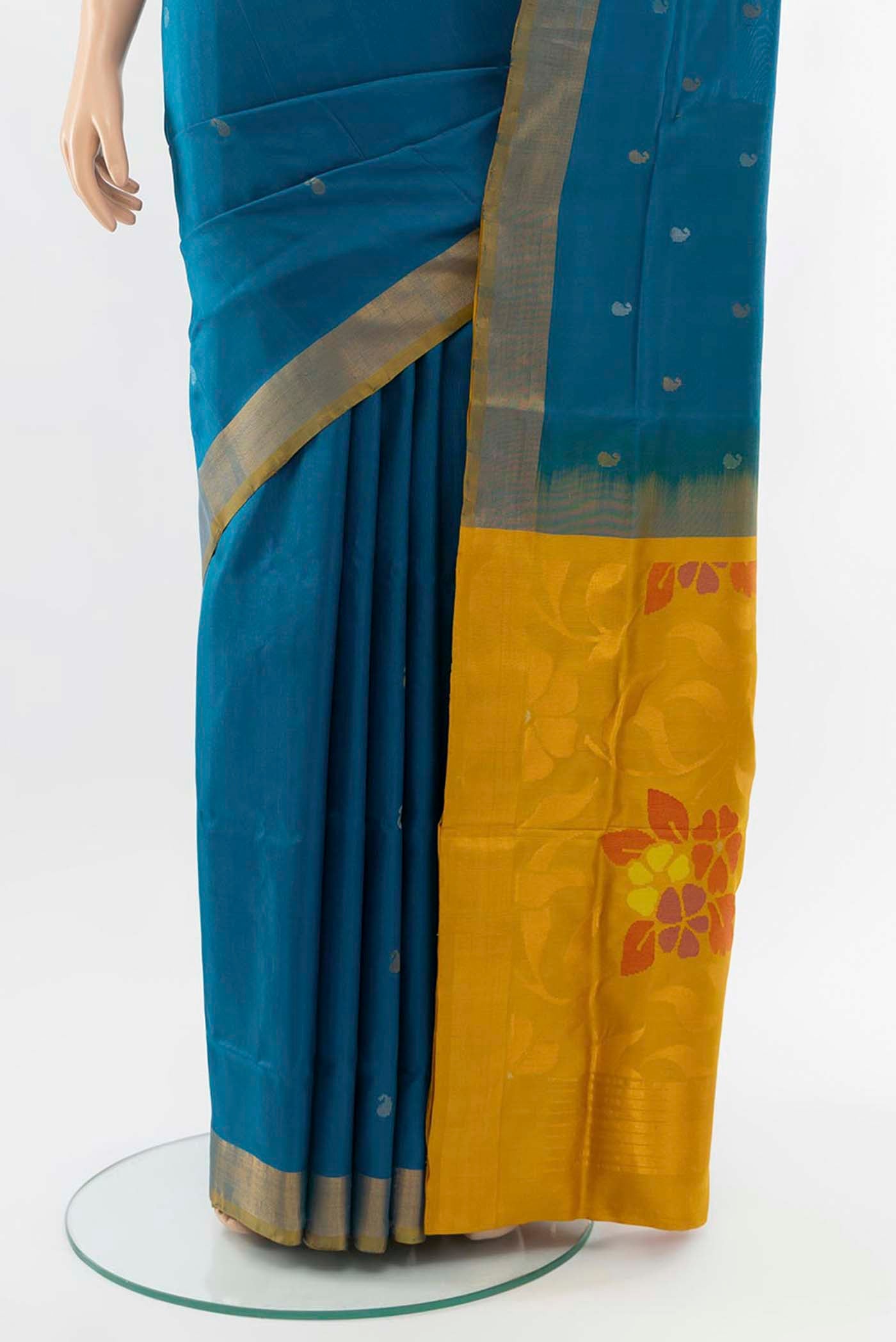 Pleats and pallu of Light Blue Uppada Silk Saree with Zari Butta on the body and Silk Border