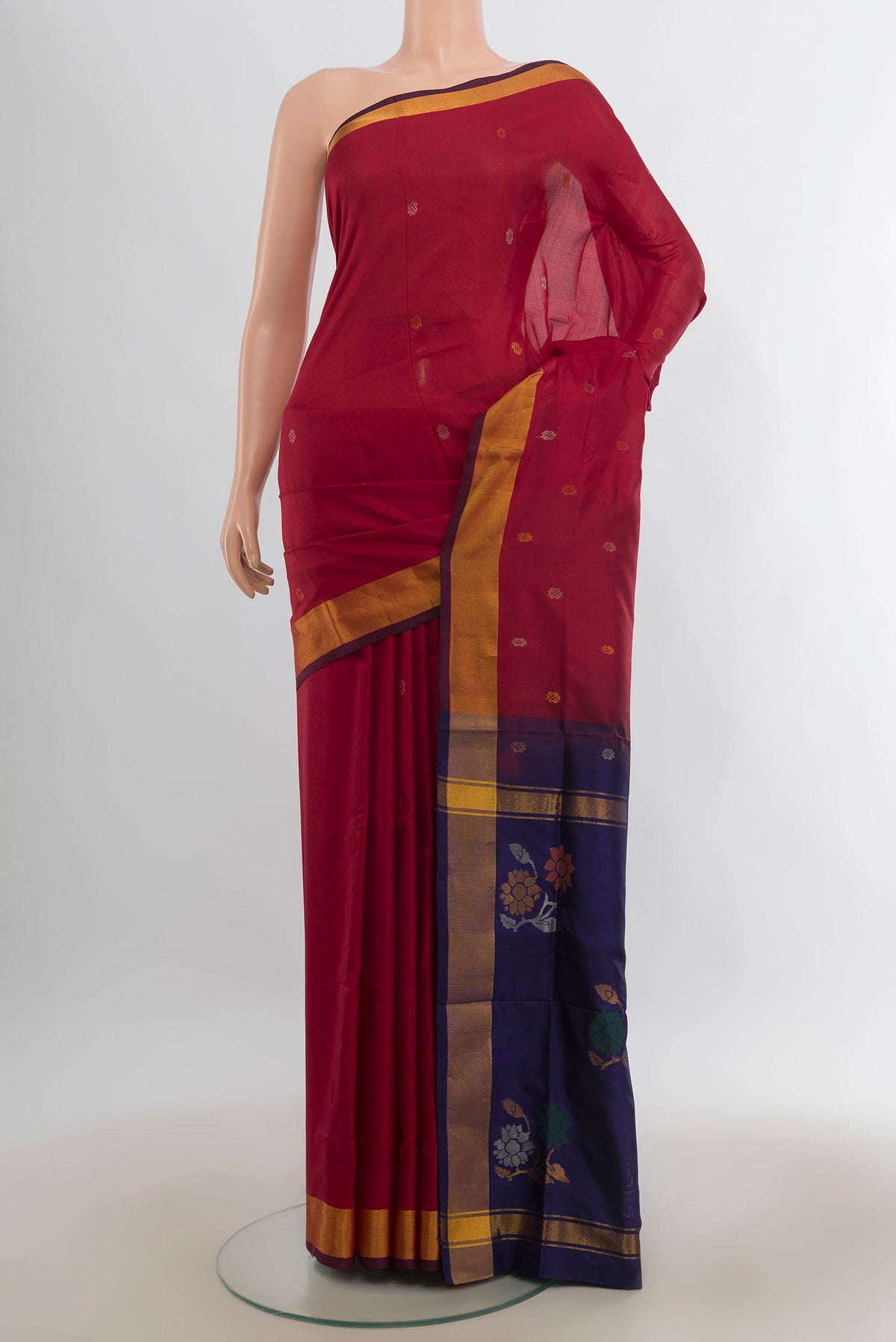 Pure Silk Red Uppada Saree with Zari Butta on the body and Zari Border.  displayed on a mannequin