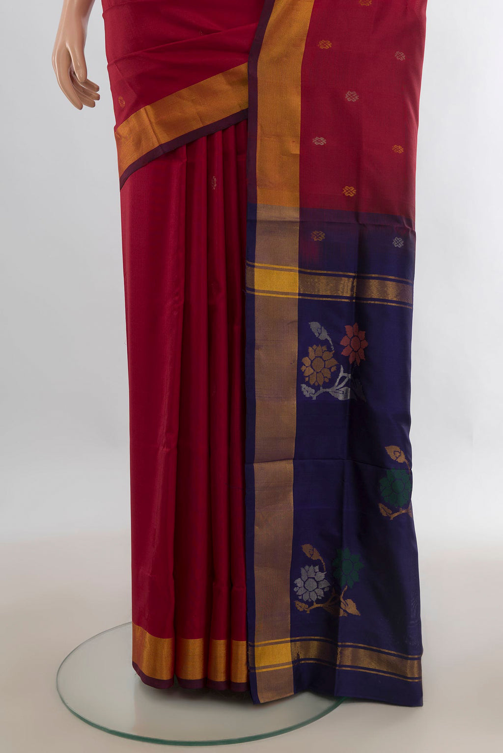 Pleats and pallu of Pure Silk Red Uppada Saree with Zari Butta on the body and Zari Border. 