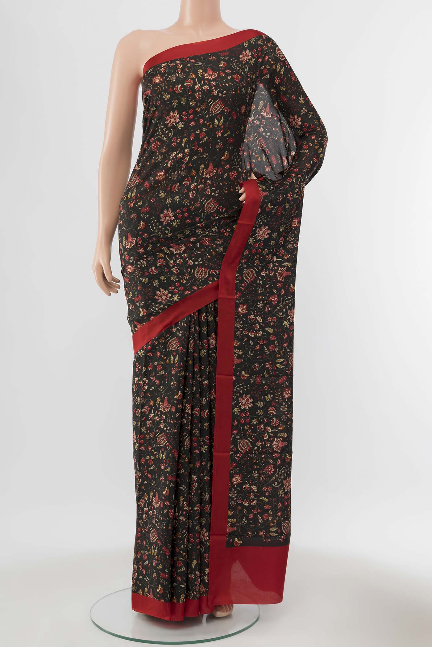 Black Printed Silk Saree with Thread Butta on the body and Silk Border displayed on a mannequin