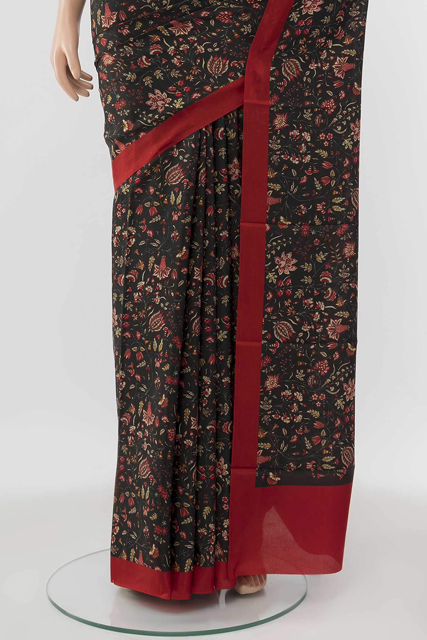 Pleats and pallu of Black Printed Silk Saree with Thread Butta on the body and Silk Border
