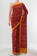 Maroon Printed Silk Saree with Printed design on the body and Plain Border displayed on a mannequin