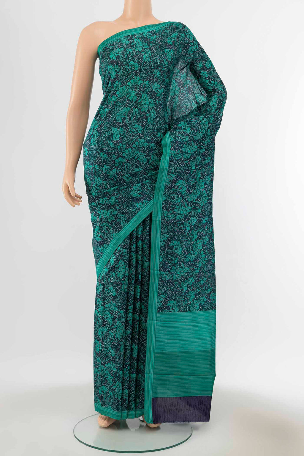 Navy Blue Blended Printed Silk Saree with Floral Print on the body and Thread Border displayed on a mannequin