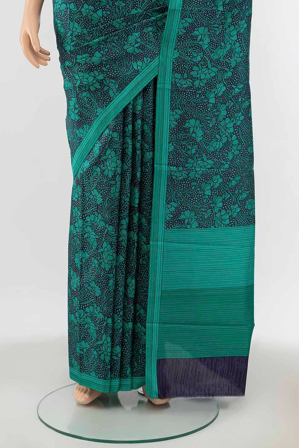 Pleats and pallu of Navy Blue Blended Printed Silk Saree with Floral Print on the body and Thread Border