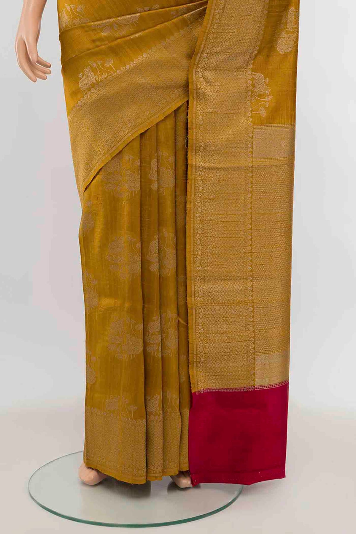 Pleats and pallu of Mustard Banarasi Raw Silk Saree with Zari Brocade on the body and Silk Border
