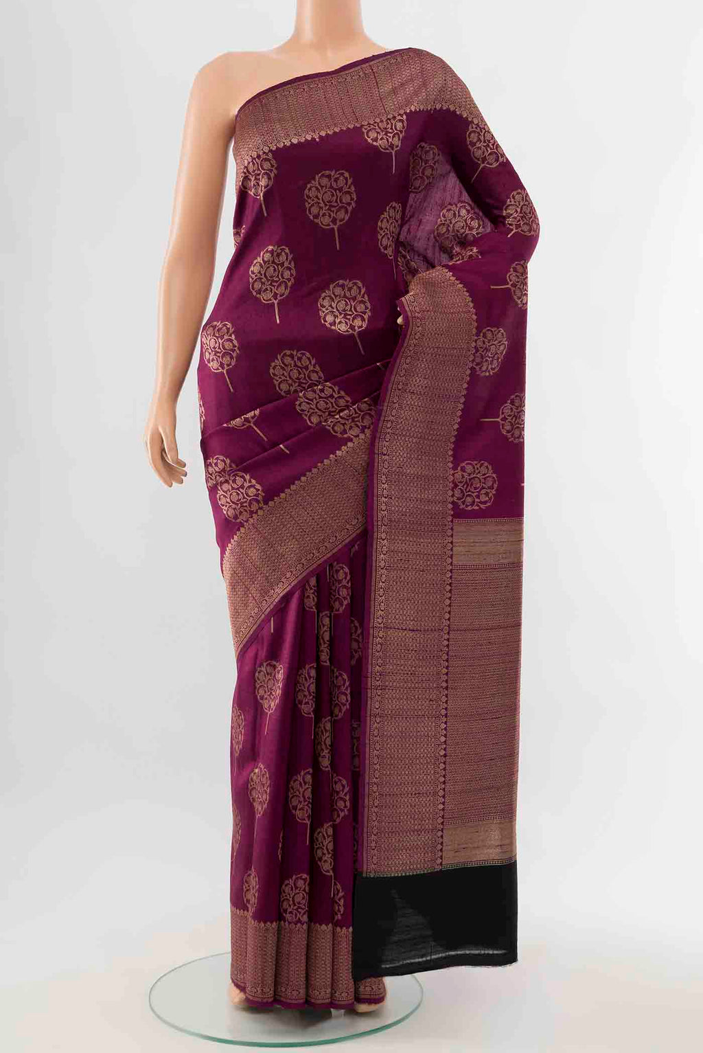 Magenta Tussar Silk Saree with Zari Butta on the body and Silk Border displayed on a mannequin