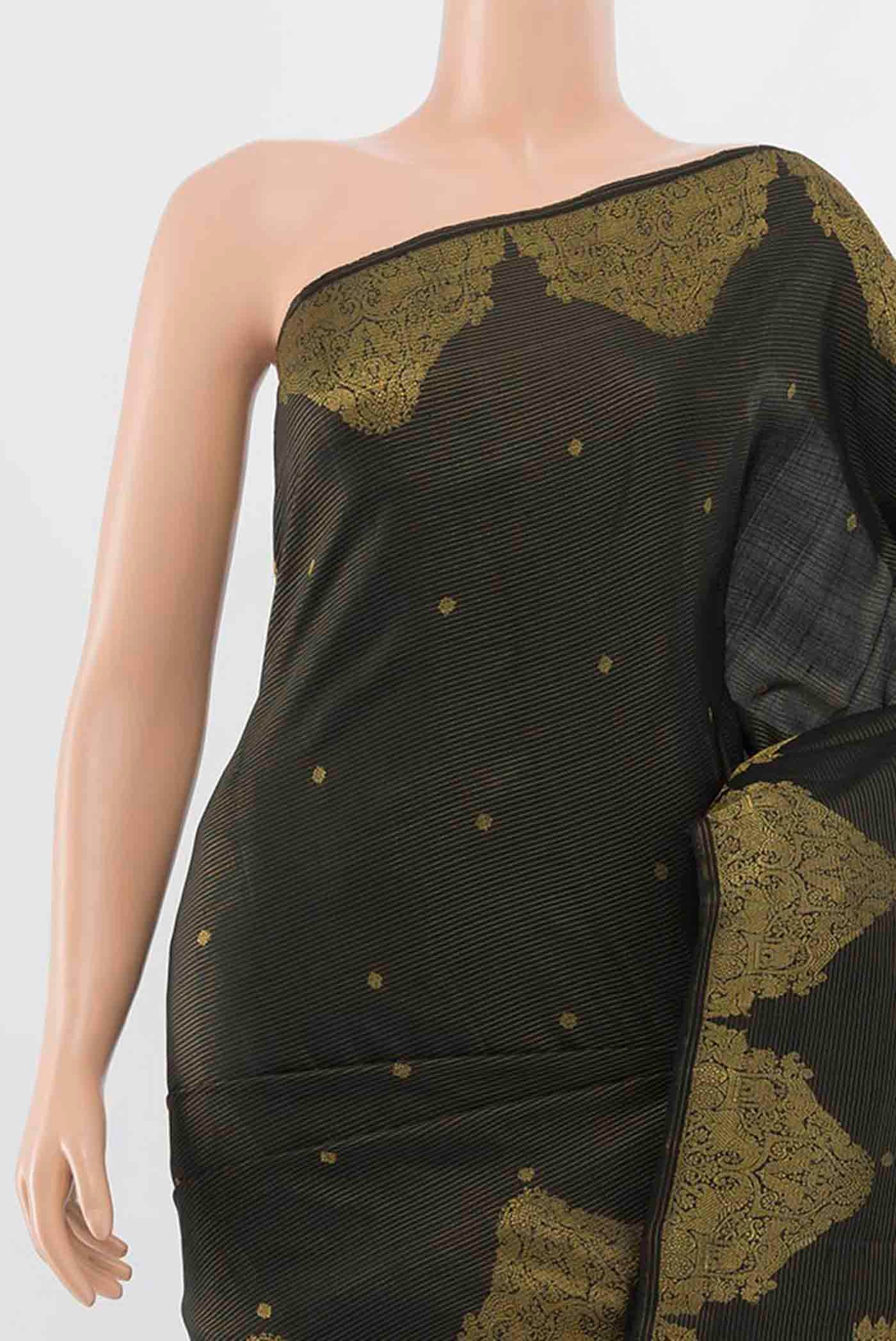 Border image of Black Kanchipuram Silk Saree with Zari Butta on the body and Silk Border