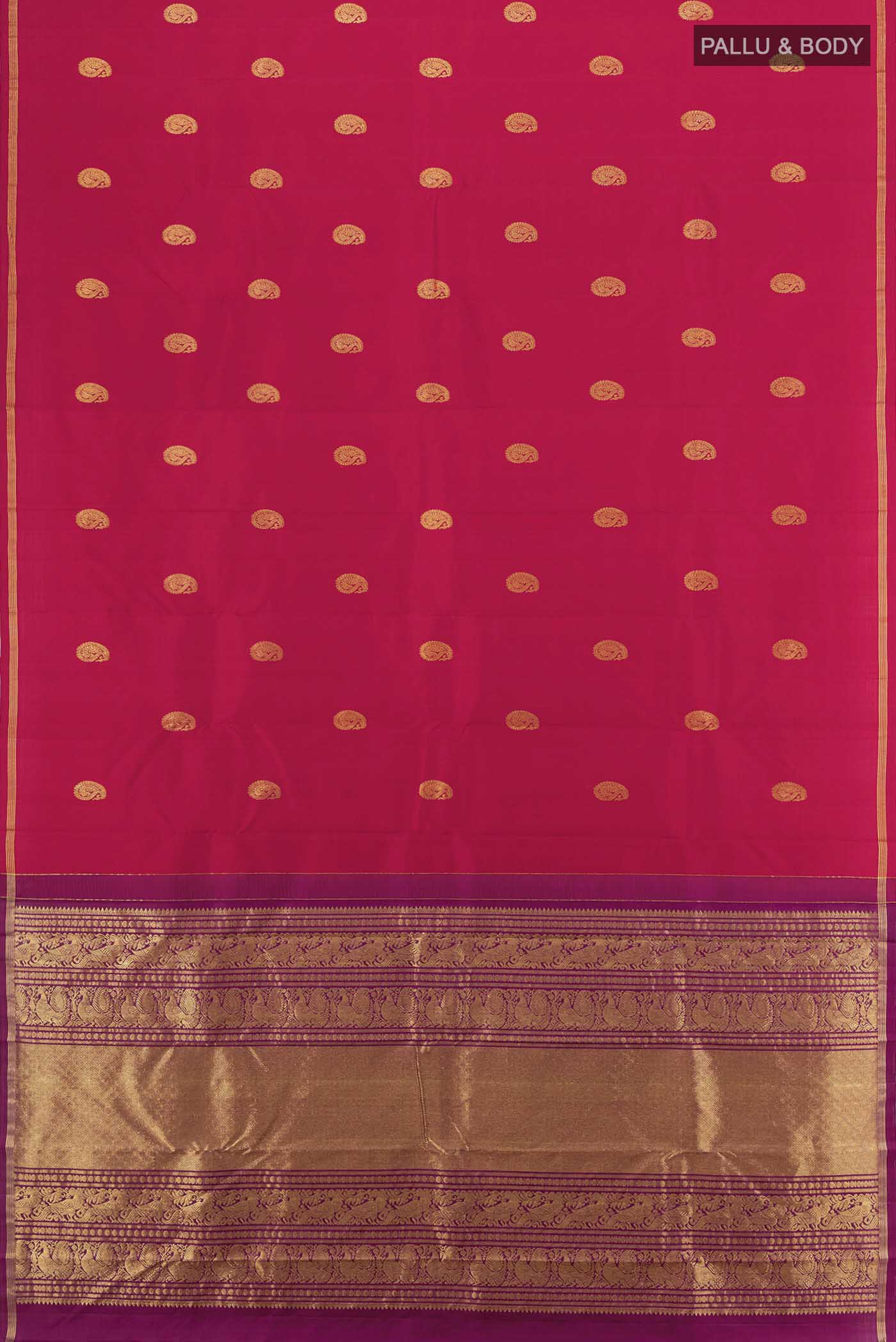 Flat view of Maroon Kanchipuram Silk Saree with Zari Butta on the body and Silk Border. 