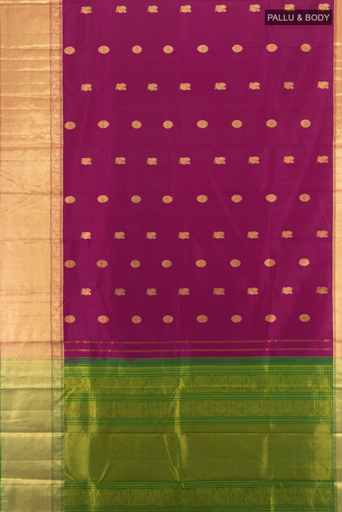 Flat view of Purple Kanjivaram Silk Saree with Zari Butta on the body and Silk Border. 