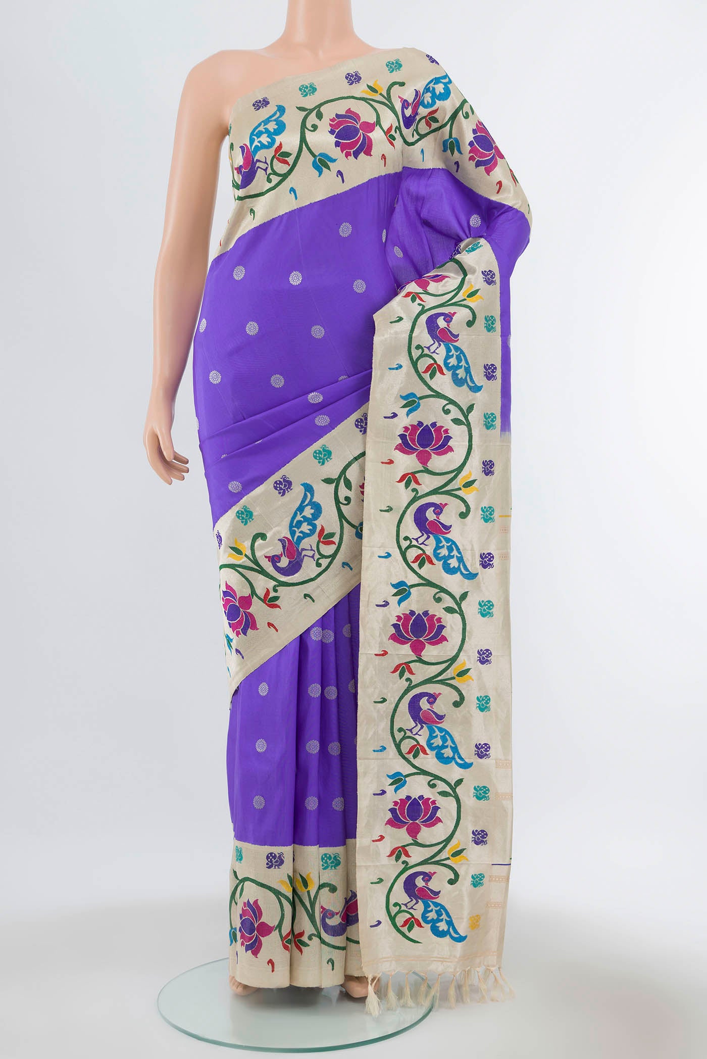 Pure Silk Pure Zari Lavender Gadwal Saree with Zari Butta on the body and Zari Border displayed on a mannequin