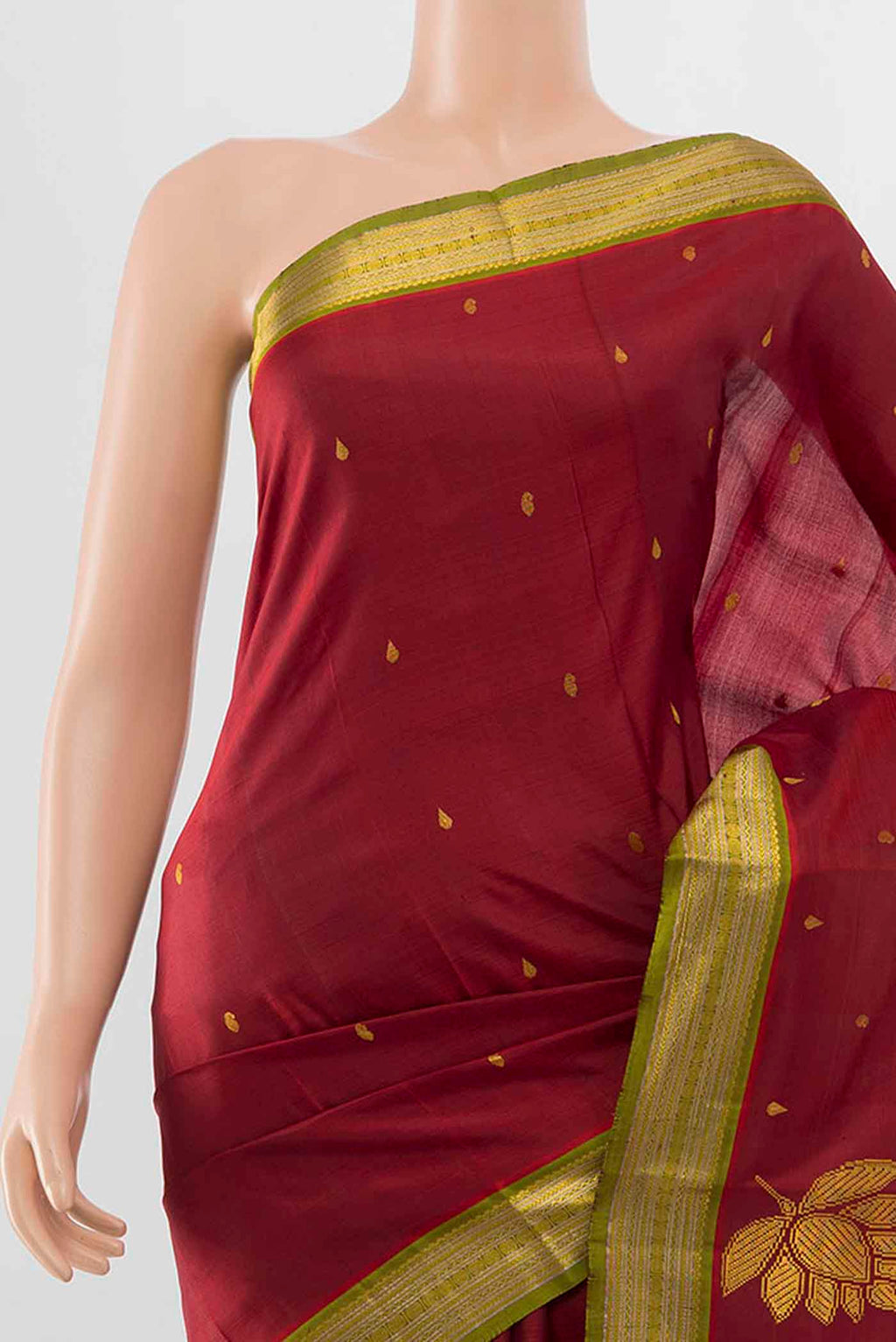 Border image of Pure Silk Pure Zari Maroon Kanchipuram Saree with Zari Butta on the body and Zari Border