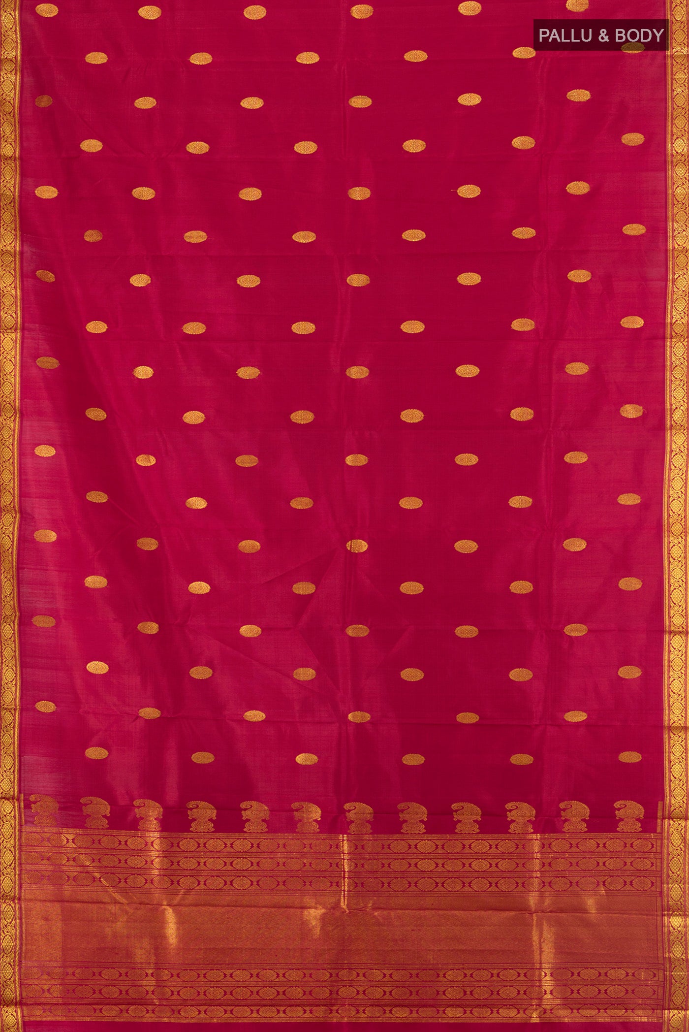 Flat view of Maroon Kanjivaram Silk Saree with Zari Butta on the body and Zari Border. 