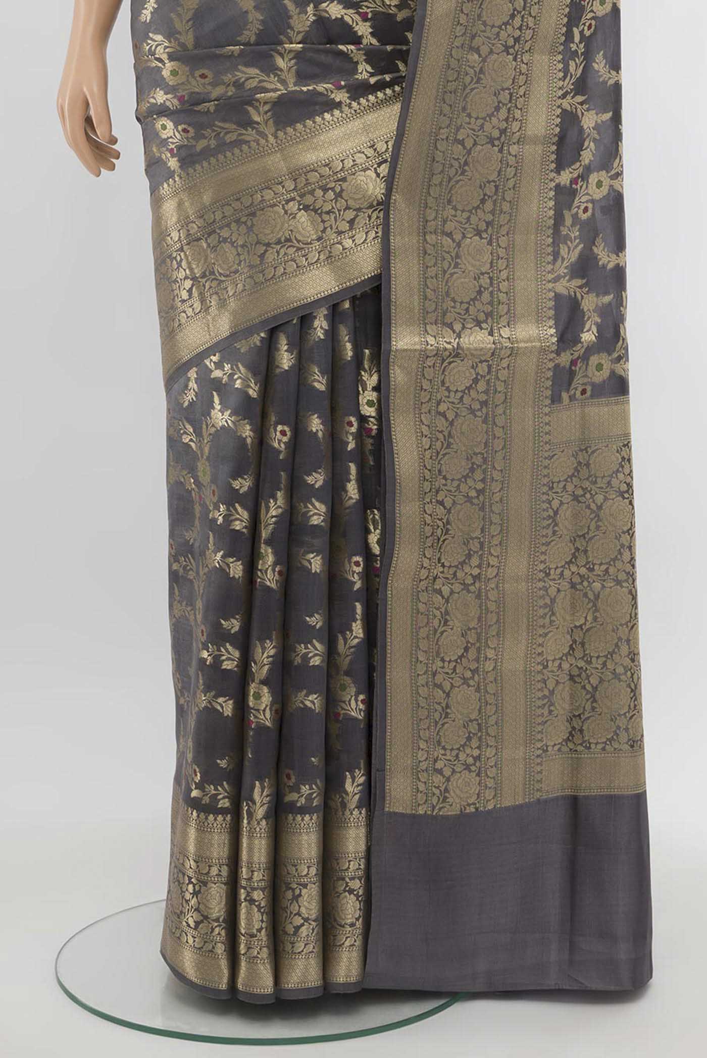 Pleats and pallu of Grey Banarasi Raw Silk Saree with Zari Butta on the body and Silk Border. 