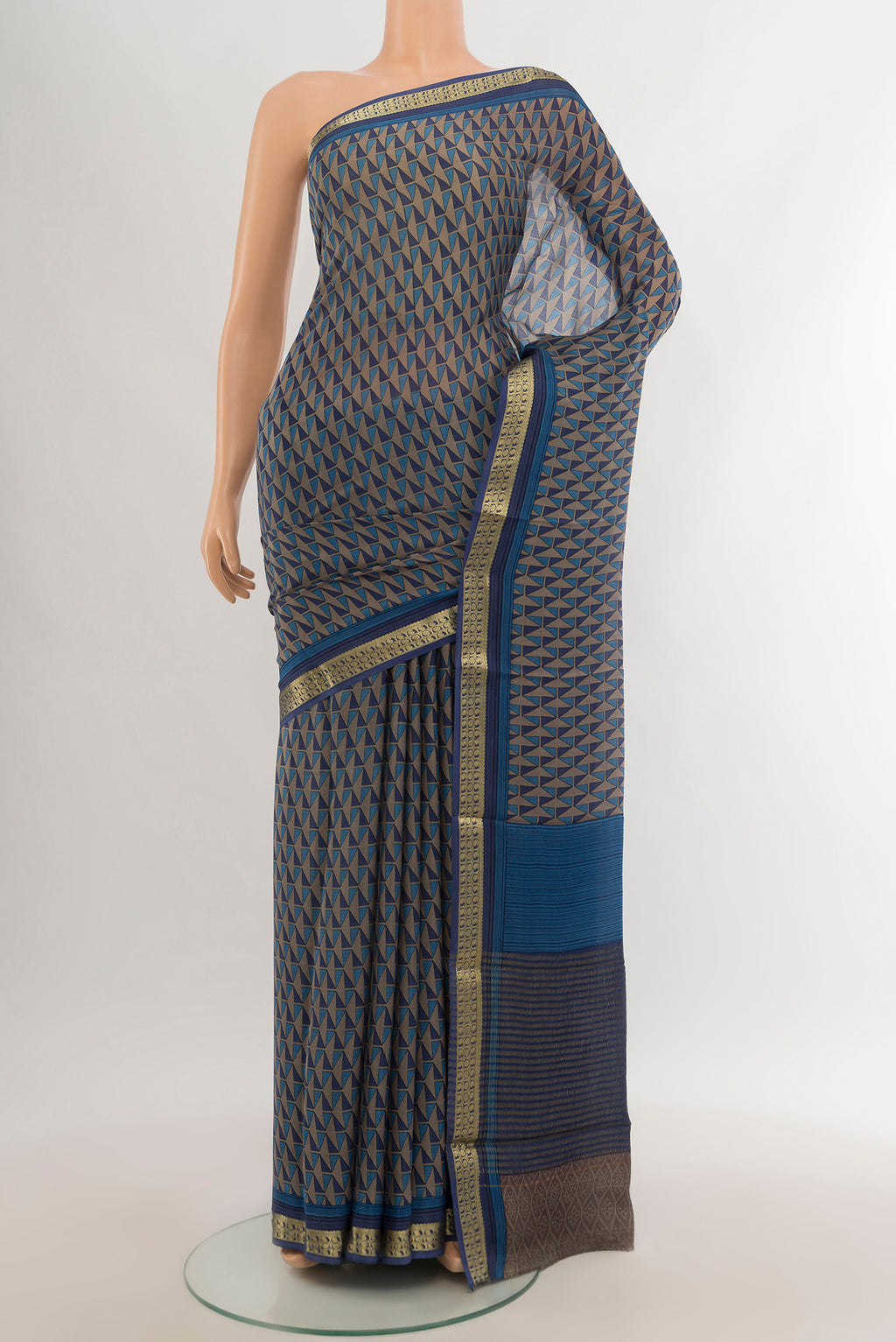 Multi Color Crepe Saree with Floral Print on the body and Zari Border.  displayed on a mannequin