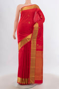 Red Kanjivaram Silk Saree with Zari Butta on the body and Silk Border.  displayed on a mannequin