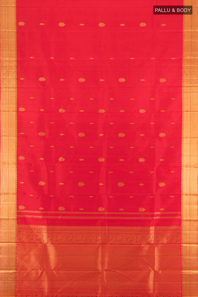 Flat view of Red Kanjivaram Silk Saree with Zari Butta on the body and Silk Border. 