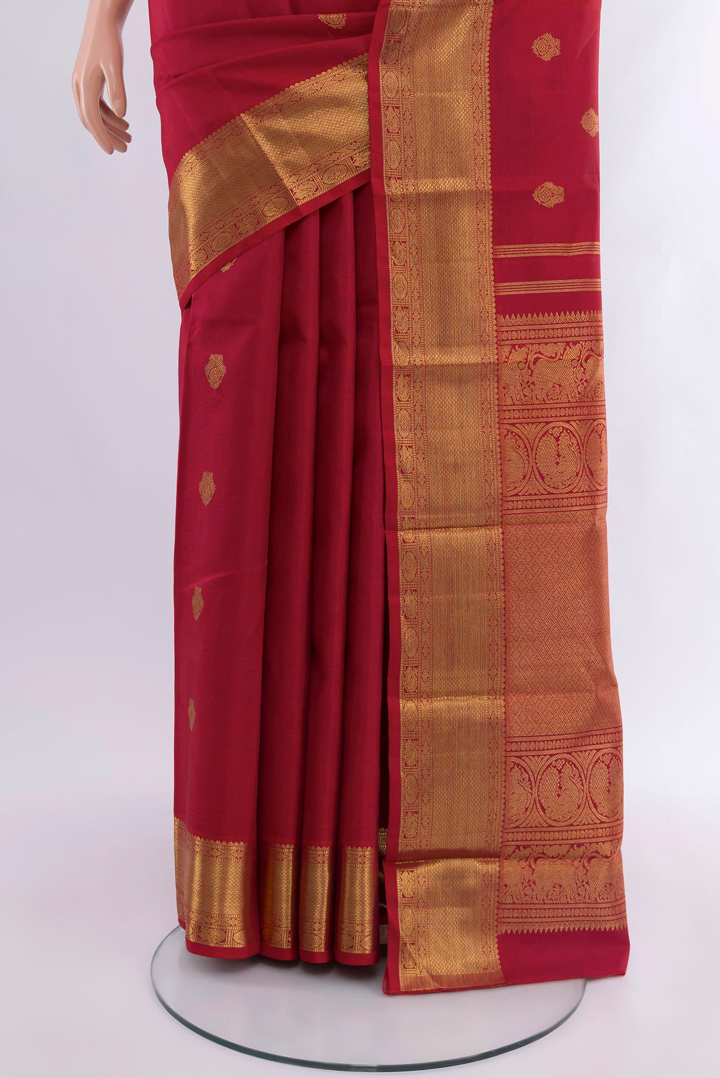 Pleats and pallu of Pure Silk Pure Zari Red Kanjivaram Saree with Zari Butta on the body and Zari Border. 