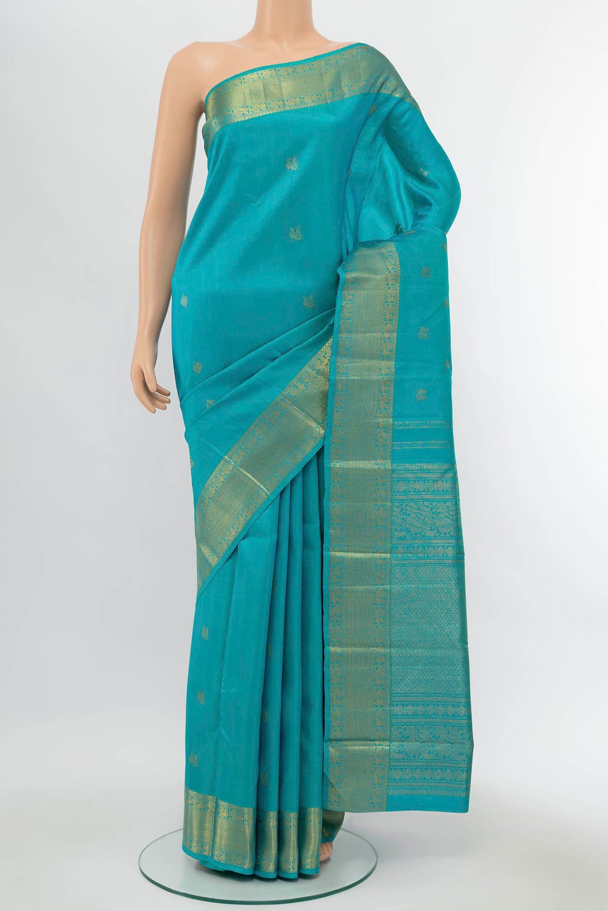 Pure Silk Pure Zari Coral Kanchipuram Saree with Zari Brocade on the body and Silk Border displayed on a mannequin