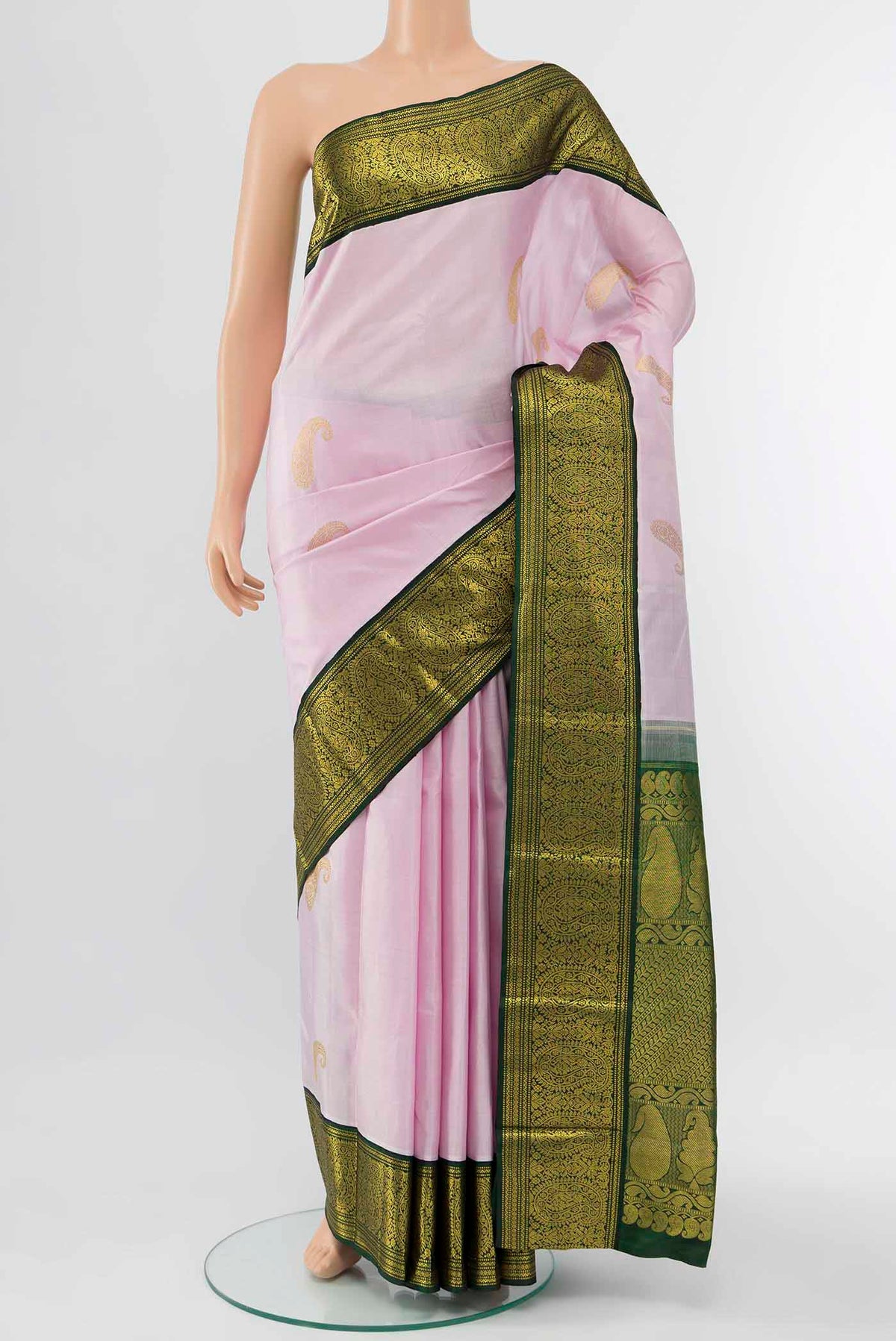 Pure Silk Pure Zari Rose pink Kanchipuram Saree with Zari Butta on the body and Zari Border displayed on a mannequin