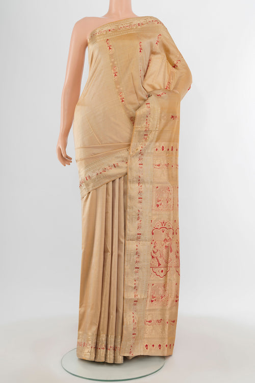 Beige Baluchari Silk Saree with Zari And Thread Butta on the body and Zari Border.  displayed on a mannequin