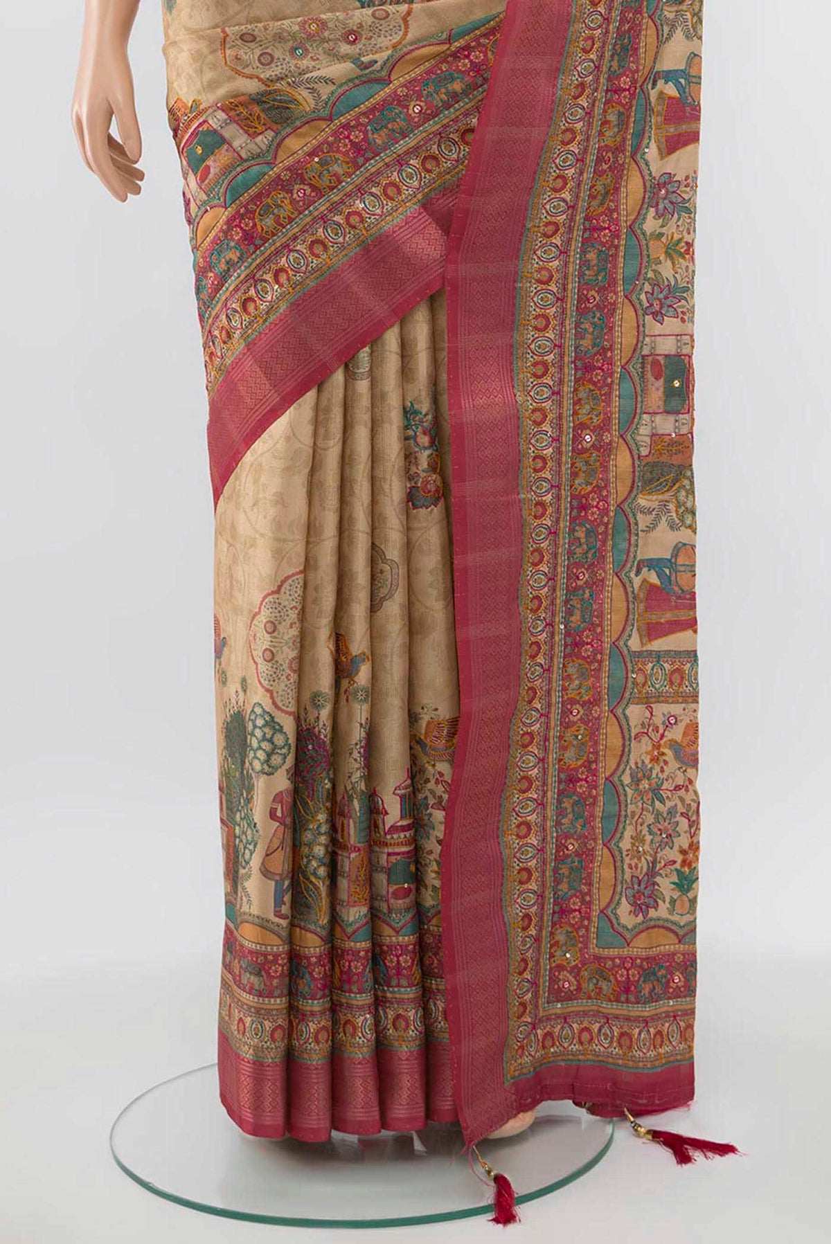 Pleats and pallu of Beige Art Silk Saree with Zari Butta on the body and Zari Border. 