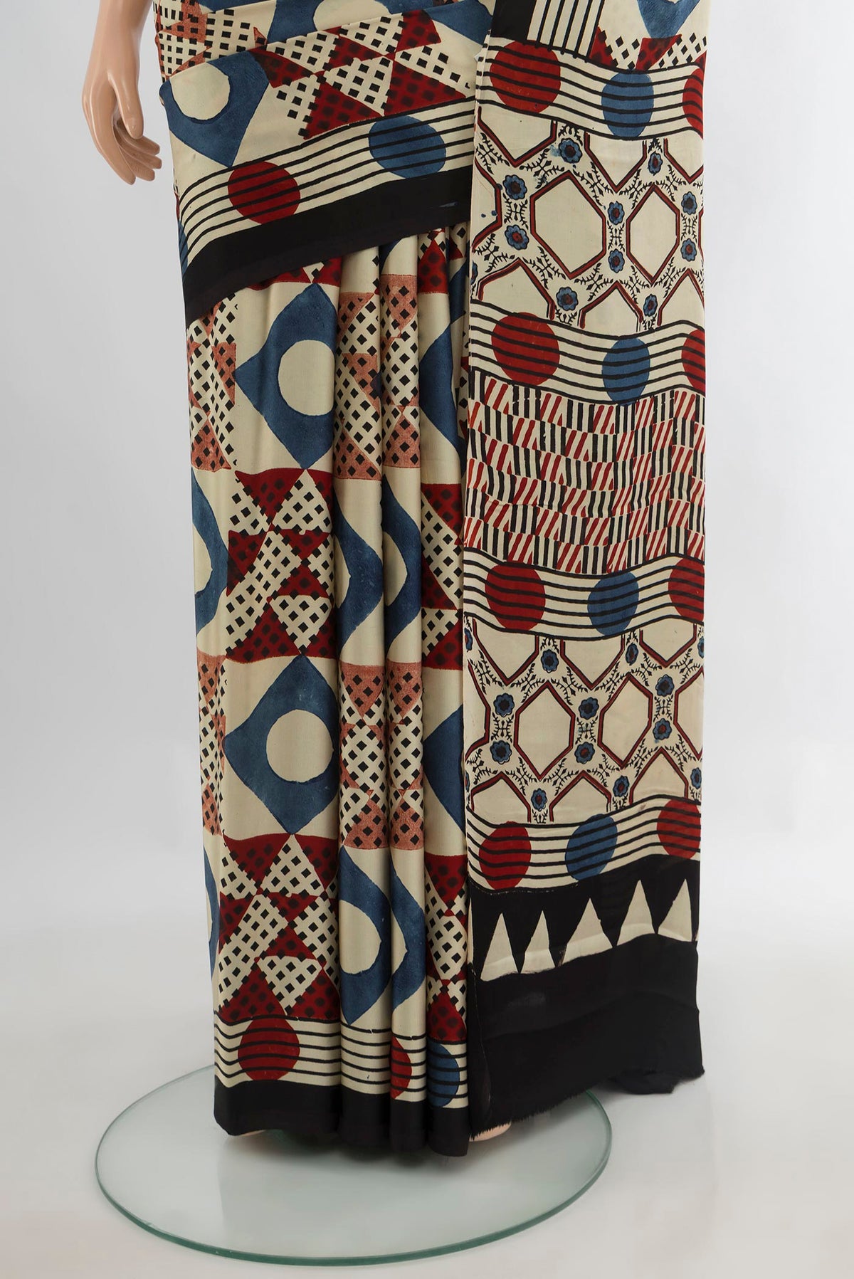 Pleats and pallu of Beige Blended Satin Crepe Saree with Ajrakh Print on the body and Printed Border. 