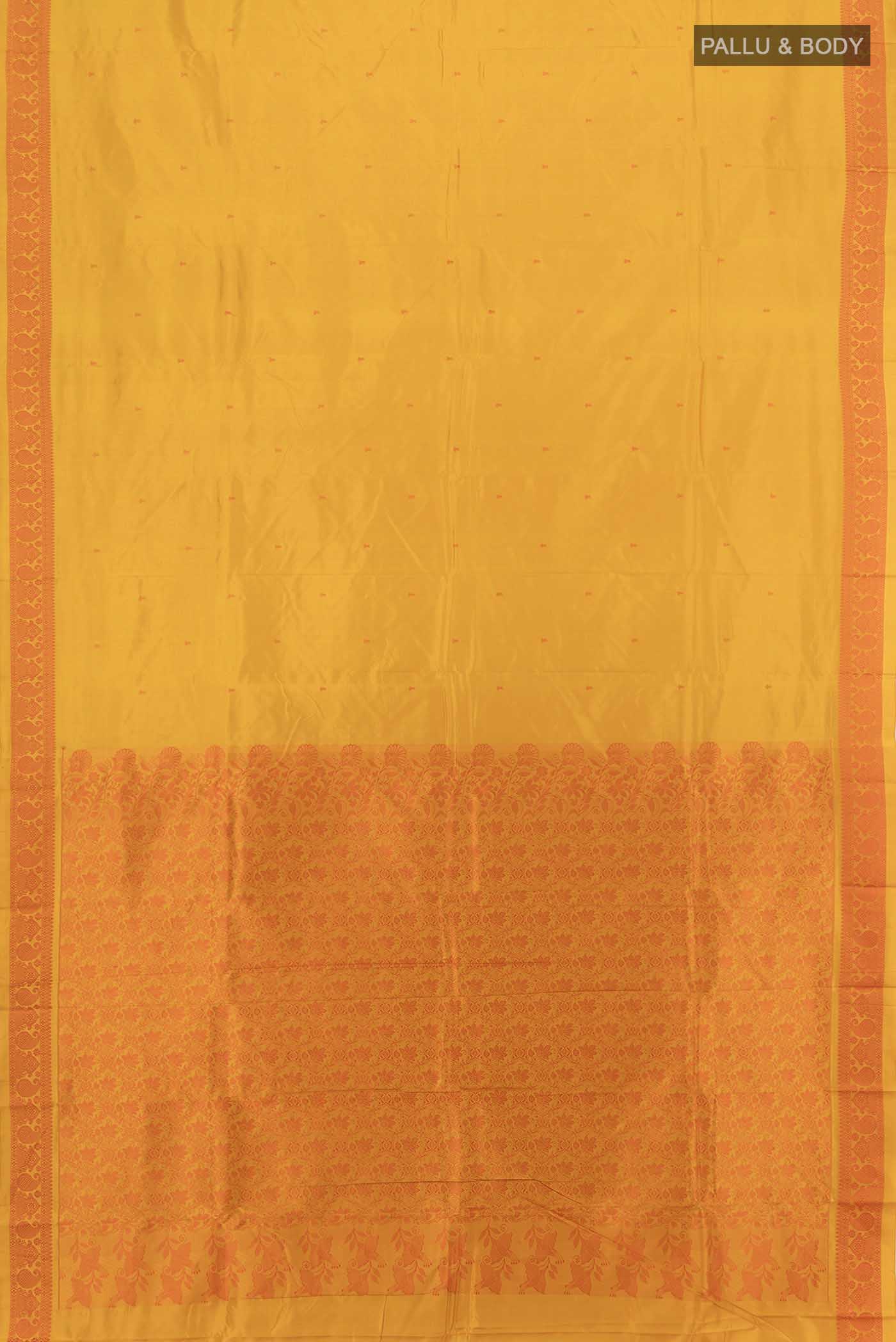 Flat view of Yellow Kanjivaram Silk Saree with Zari Butta on the body and Silk Border. 