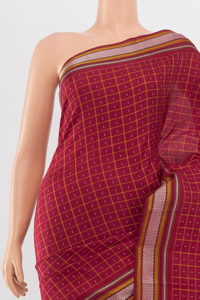 Border image of Maroon Kanjivaram Silk Saree with Zari Butta on the body and Silk Border. 
