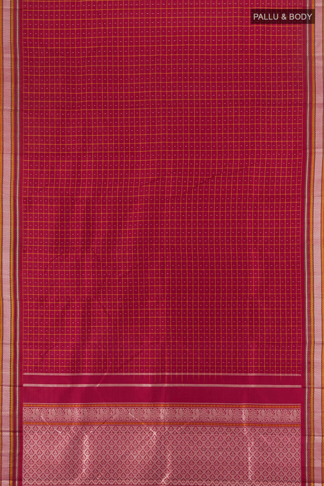 Flat view of Maroon Kanjivaram Silk Saree with Zari Butta on the body and Silk Border. 