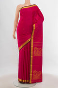 Dark Pink Pochampally Saree with Zari Butta on the body and Silk Border.  displayed on a mannequin