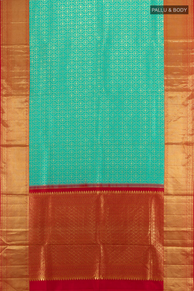 Flat view of Sky Blue Kanjivaram Silk Saree with Zari Butta on the body and Silk Border. 