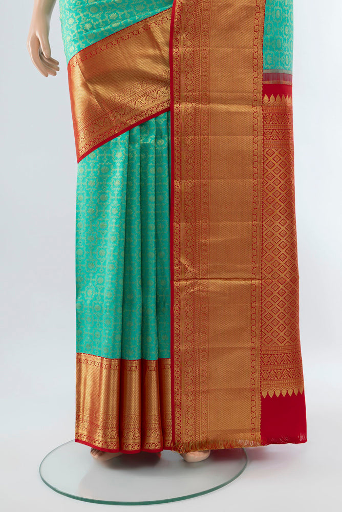 Pleats and pallu of Sky Blue Kanjivaram Silk Saree with Zari Butta on the body and Silk Border. 