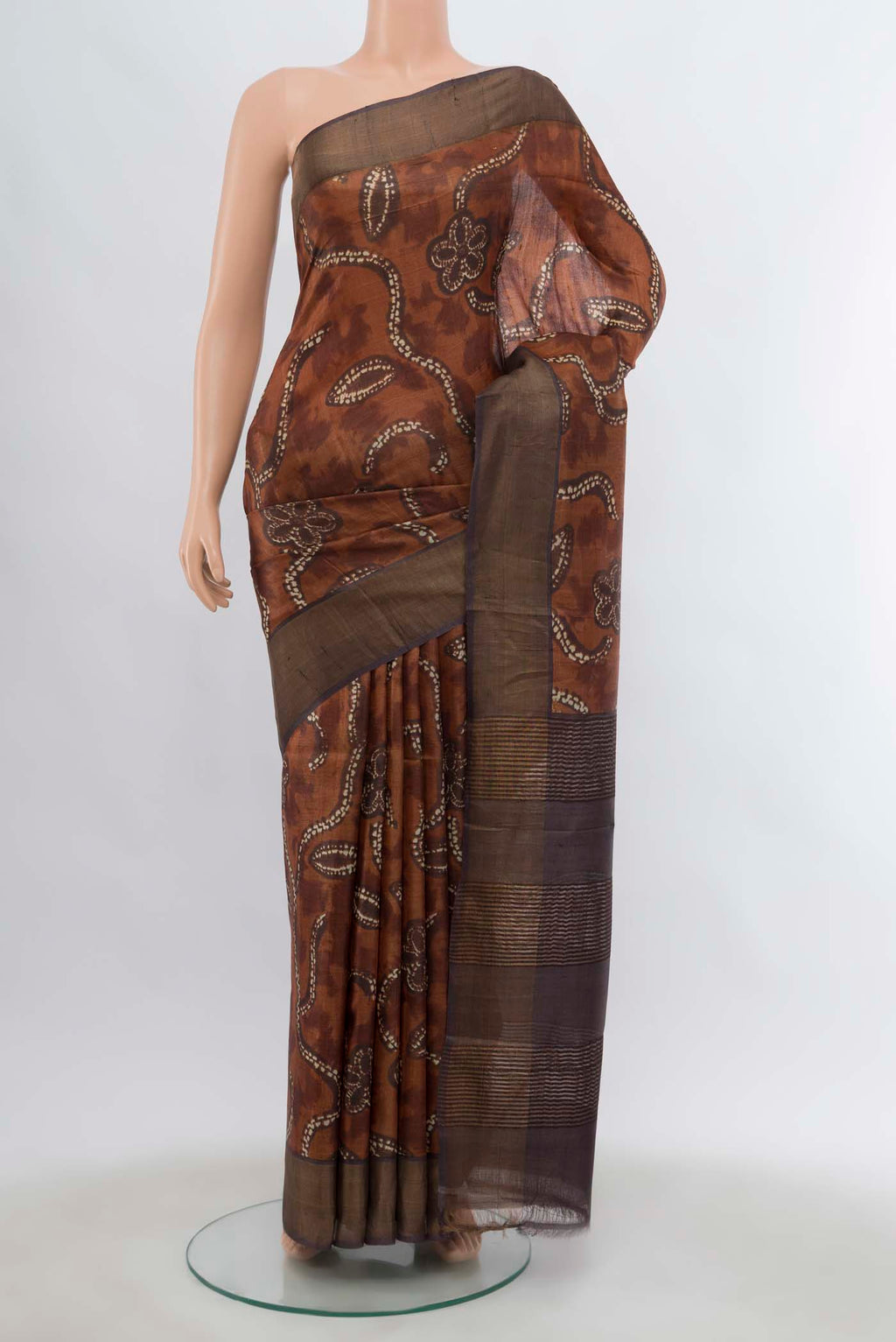 Brown Tussar Silk Saree with Zari Butta on the body and Silk Border displayed on a mannequin