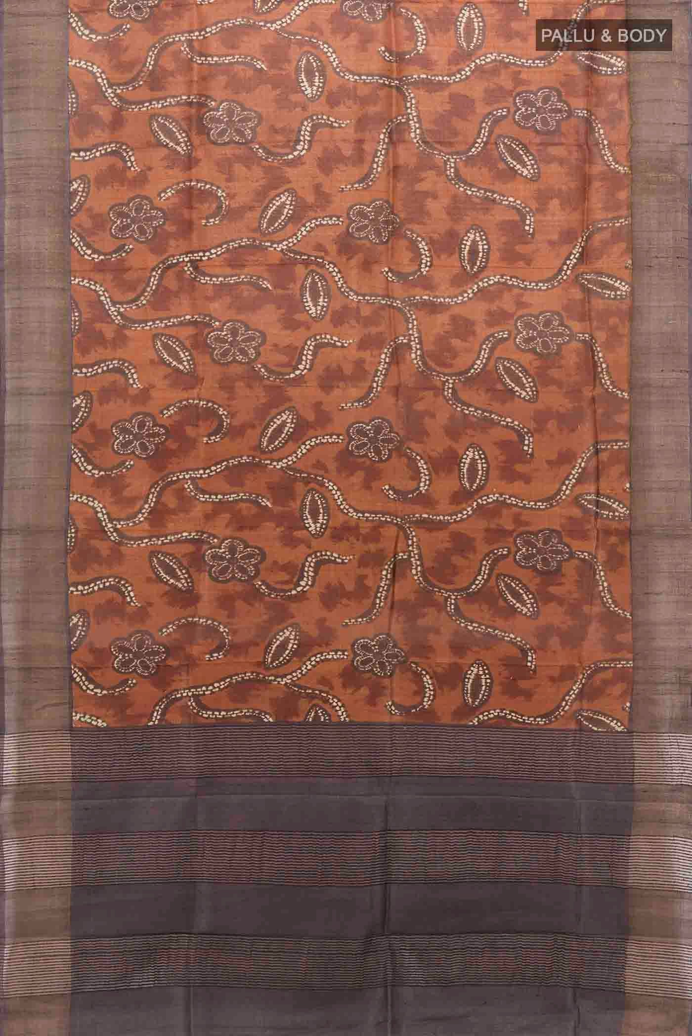 Flat view of Brown Tussar Silk Saree with Zari Butta on the body and Silk Border