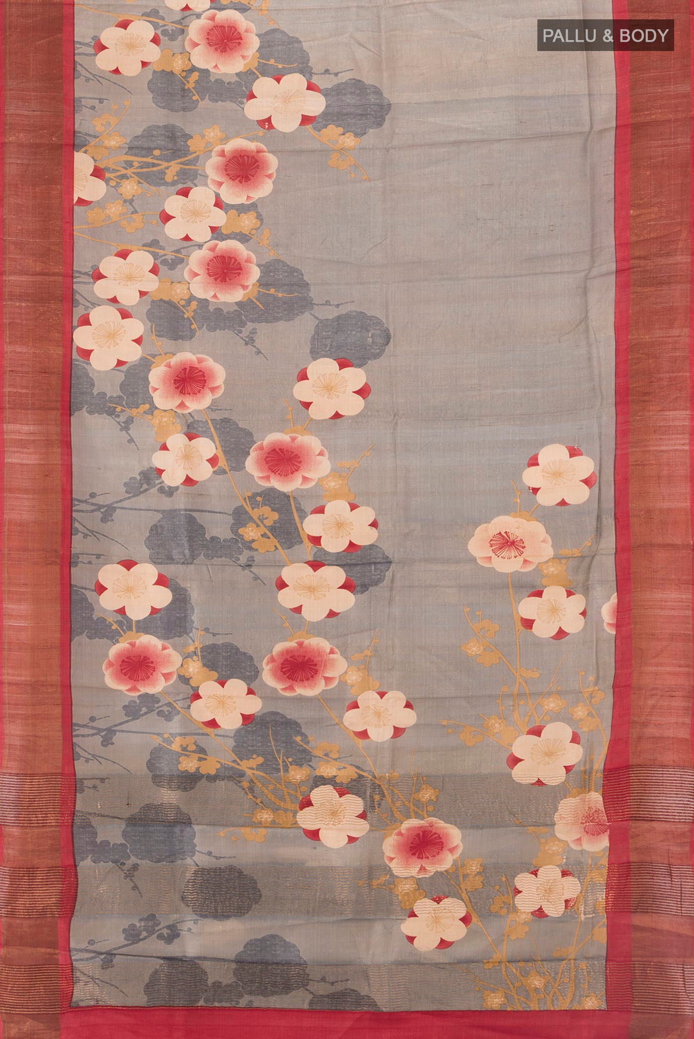 Flat view of Grey Tussar Silk Saree with Floral Print on the body and Zari Border. 