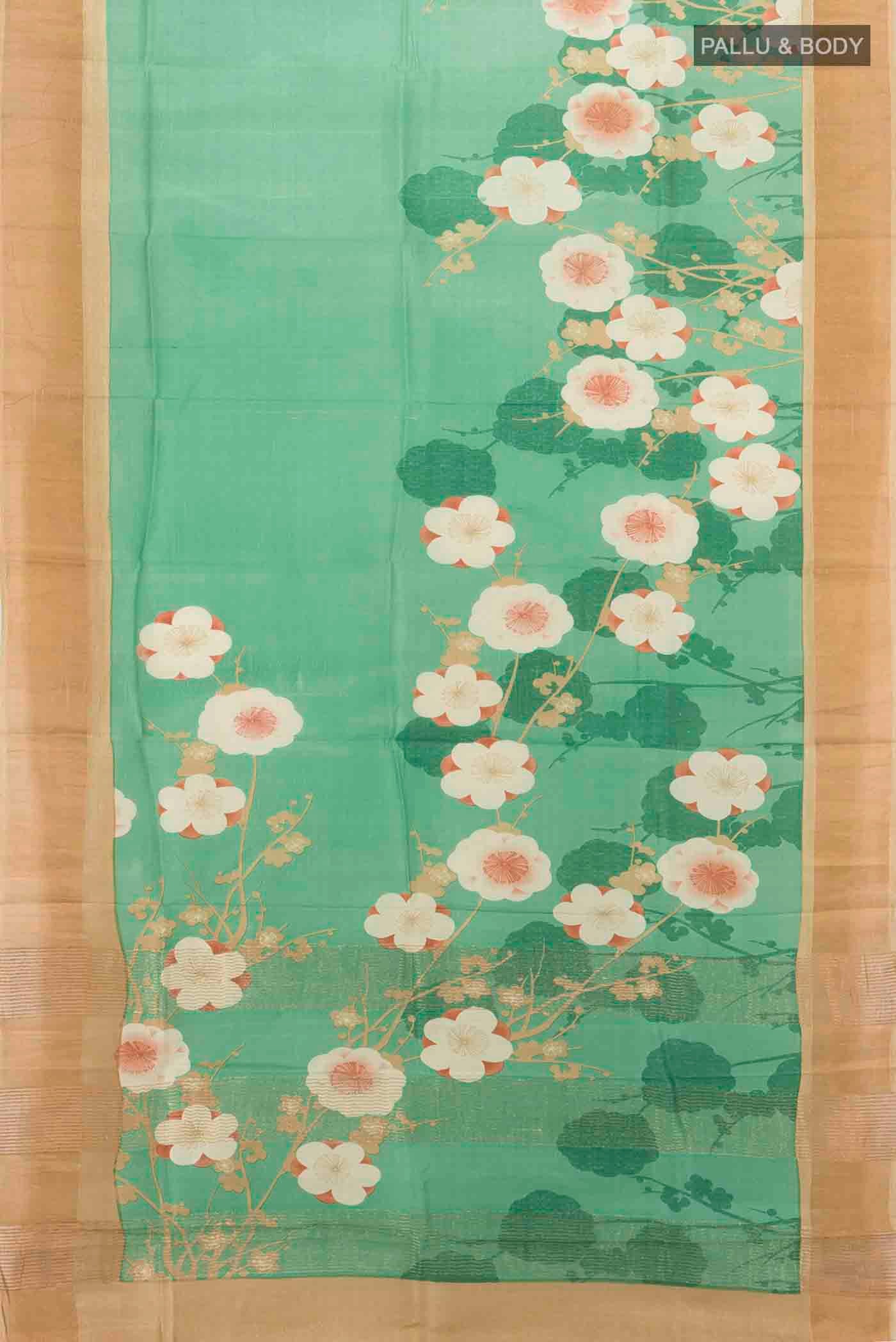 Flat view of Light Green Tussar Silk Saree with Zari Butta on the body and Silk Border