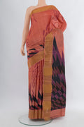 Coral Tussar Silk Saree with Printed design on the body and Zari Border.  displayed on a mannequin